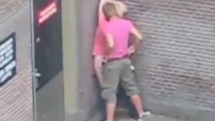 Pink shirt man fucked his chick in the ass right on the street