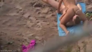 couple is having wild sex on the beach